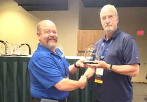 Dana Hennis CFSEI vice chair Patrick Ford R.A. Smith.