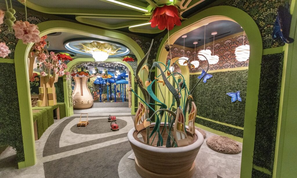 Flower Power | Peeks-a-Boo! lets little ones crawl, hide and climb through the flower pot. Photo courtesy of South Valley