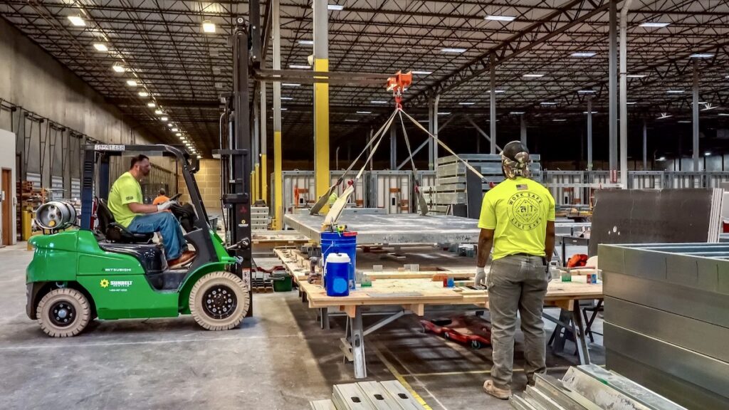 2024 SFIA Award winner: Crews added drywall, custom cut with CNC machines, and moved the assemblies with heavy equipment.