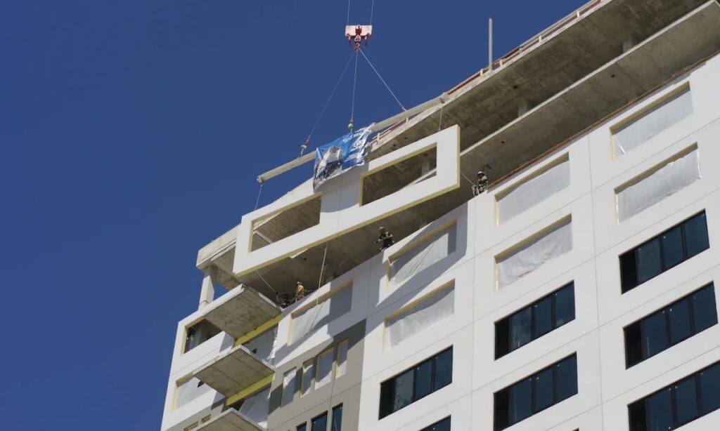 Panelization produced an exterior system with less weight, less cold-formed steel (CFS) and no welding, the specialty engineer for the Wynkoop Street project said.