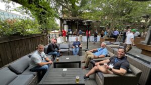 CFSEI Expo participants unwind with brews and conversation at Raleigh Beer Garden, home to games, rooftop views and 386+ beers on tap from around the world.