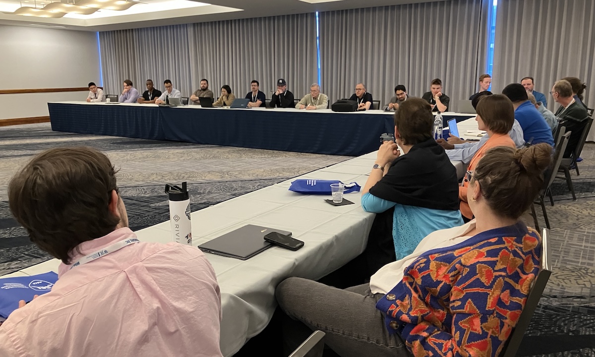 Sean Agostino (left), cochair of ASCE’s SEI Sustainability Committee, leads a session on embodied carbon and lifecycle analysis at Structures Congress 2025.