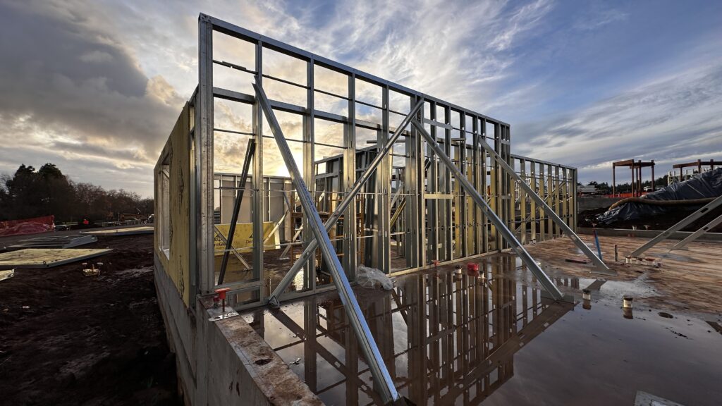 CEMCO cold-formed steel (CFS) catches the evening light at a UCSC housing project, where crews framed 30 buildings and two community centers in three months. Photo courtesy of CEMCO.