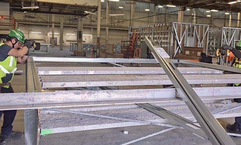 Prefabricated cold-formed steel (CFS) laboratory pods reduced on-site carpentry by 40%.