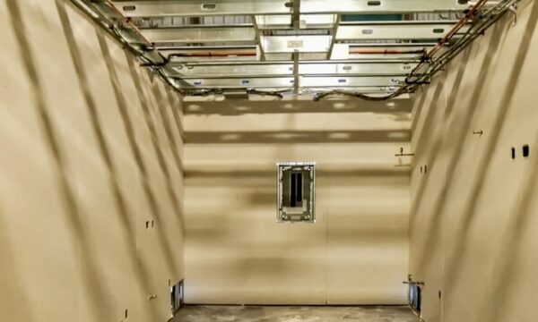 Installers could remove the spreader beams easily with minimal disruption to the interior drywall.