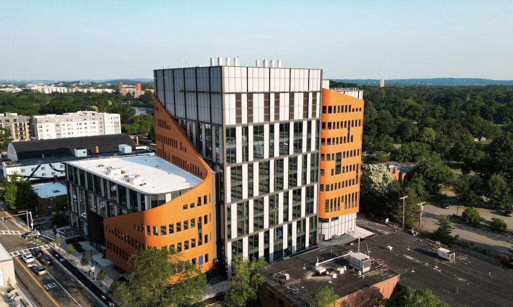 Numerous fly-by box jambs, prefabricated on site, span a few stories at Allston Labworks. T.J. McCarney installed them with a tower crane. Photo courtesy of T.J. McCarney.