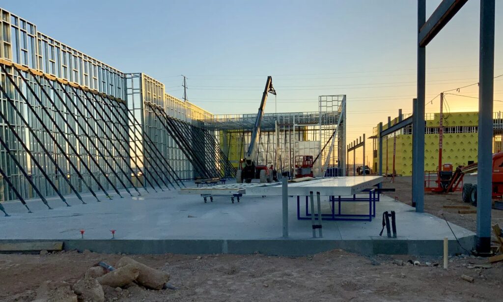 Installation of the load-bearing, prefabricated cold-formed steel (CFS) panels began early each day in Las Vegas.