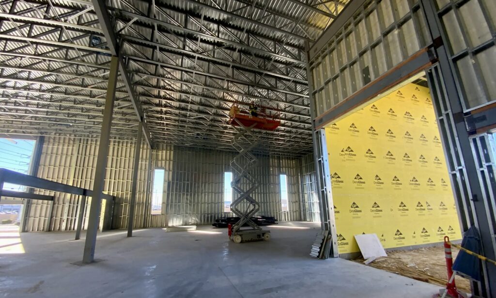 Cold-formed steel (CFS) load-bearing framing allowed for the support of both the exterior rigid insulation and the interior cavity batt insulation system.