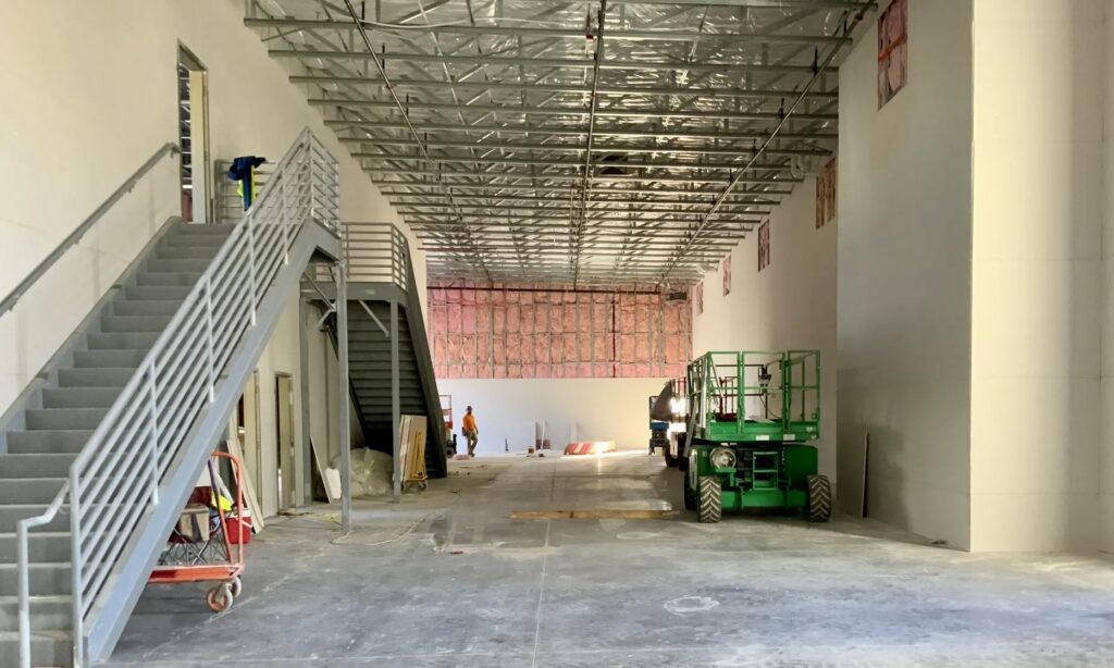 The finished space, framed with cold-formed steel (CFS), is heavily insulated and much more energy efficient than a comparable tilt-up building.