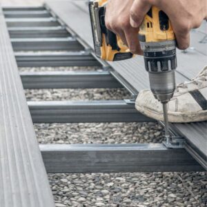 A remodeler used cold-formed steel (CFS) framing and helical piers to build a strong backyard deck. Image courtesy of BuildSteel