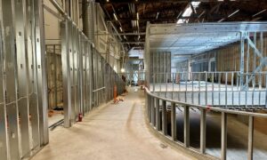 Cold-formed steel (CFS) framing supports the Mullin Transportation Design Center's building-within-a-building concept while minimizing structural loads on the historic structure.