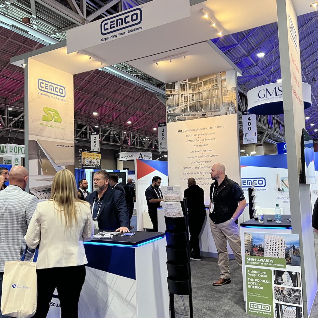 Steve Farkus of SFIA member CEMCO engages visitors at the company’s booth, showcasing cold-formed steel (CFS) framing solutions during BUILD26 in New Orleans — its SFIA Awards win poster nearby.