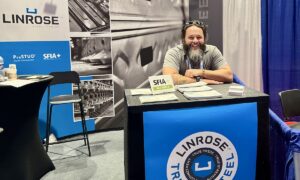 Nate Wright of SFIA member JN Linrose Manufacturing welcomes attendees to the Linrose booth during BUILD26 in New Orleans.