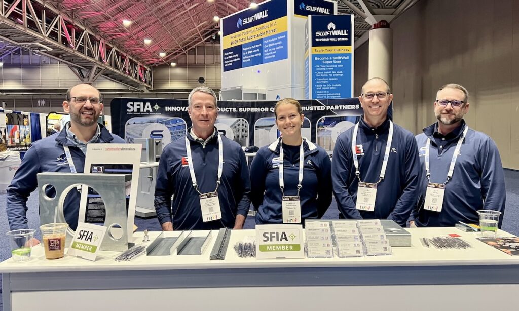 Jonathan Klein, Gerry Compton, Anabelle Broduer, Chad Onofrio and Jeff May of SFIA member Super Stud EB Metal connect with attendees at their booth during BUILD26: AWCI’s Convention + Expo in New Orleans.