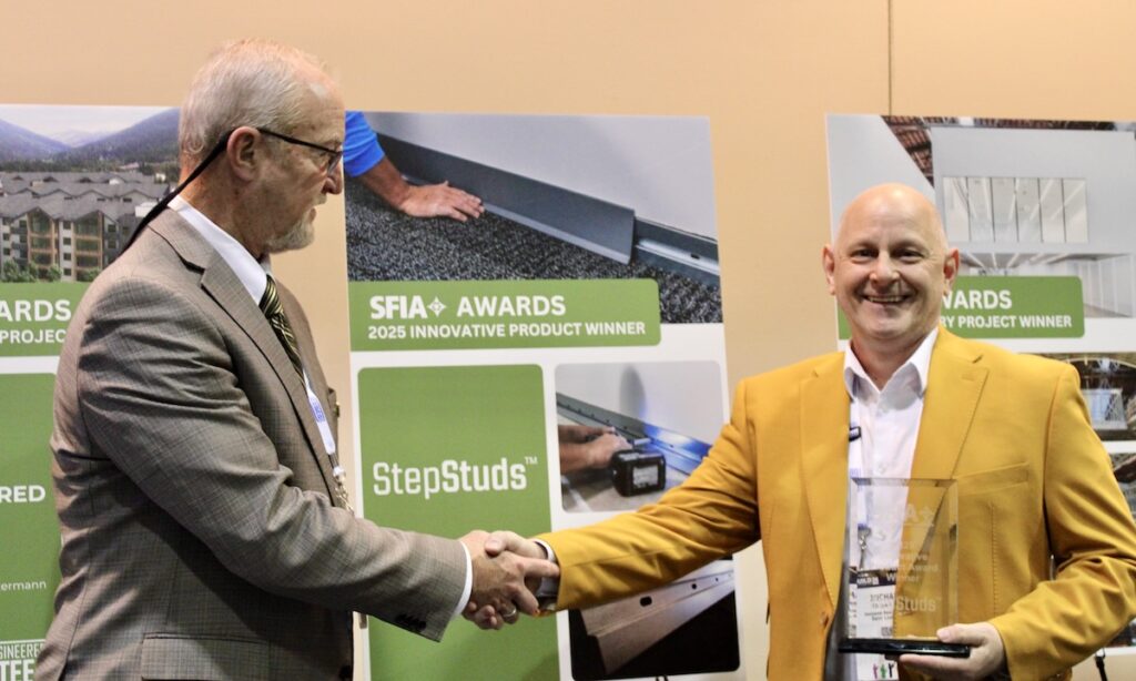 At right, Michael Cox, founder and CEO of Horizontal Base Studs LLC, accepts the 2025 Steel Framing Industry Association (SFIA) Innovative Product Award for StepStuds™ from SFIA Technical Director Pat Ford during the 2026 SFIA General Session in New Orleans.