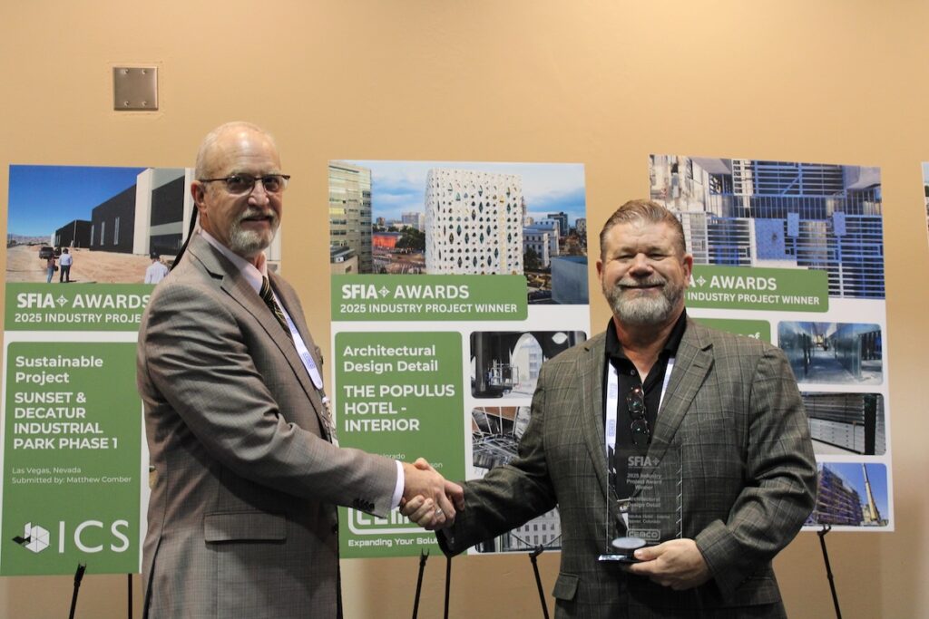 Steel Framing Industry Association (SFIA) Technical Director Pat Ford (left) presents the SFIA 2025 Architectural Design Detail Award to Steve Farkus of CEMCO during the 2026 SFIA General Session in New Orleans.