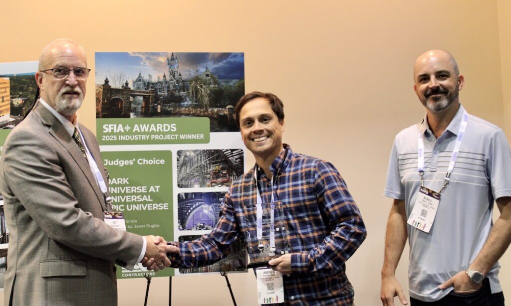 At right, Andrew Vargo and Ryan C. Smith of KHS&S Contractors accept the 2025 Steel Framing Industry Association (SFIA) 2025 Judges' Choice Award from SFIA Technical Director Pat Ford during the 2026 SFIA General Session in New Orleans.