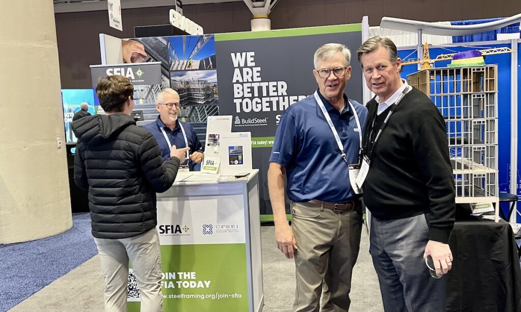 SFIA President Eric Larson and Rob Waterhouse, president and CEO at GRABBER Construction Products, visit the SFIA booth #631 at BUILD26. In back, CFSEI's Jeff Klaiman mans the booth.
