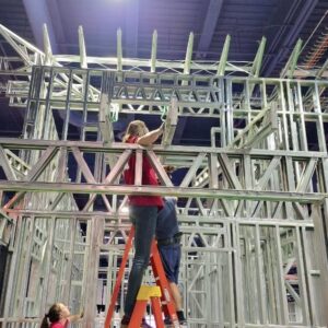 A Scottsdale team assembled a cold-formed steel framed barndominium live at METALCON 2025. Image courtesy of Scottsdale 