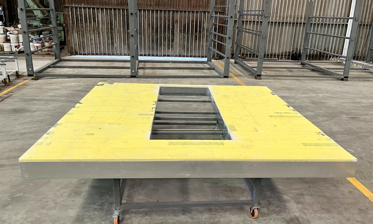 The team fabricated framing, sheathing, windows, vents, weatherproofing and EIFS off-site.