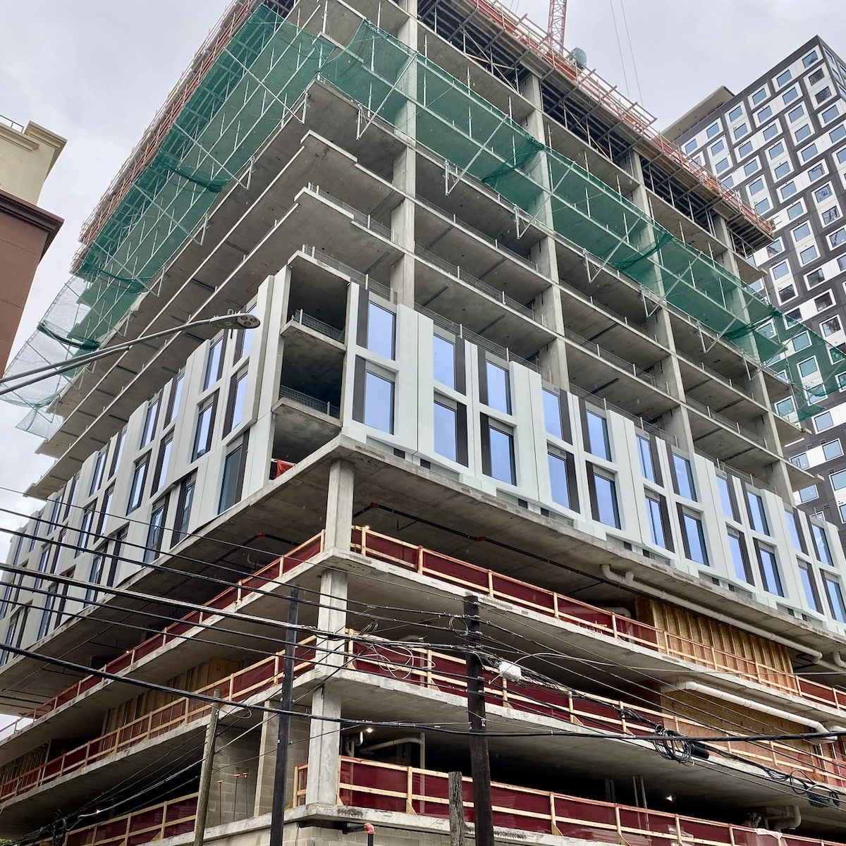 The 24th & Rio Grande Housing project used a prefabricated cold-formed steel (CFS) panelized system with a drift track attachment method.