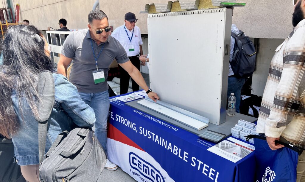 Jaime Manzo of CEMCO demonstrates a company product to engineers attending Tool Time at the 2026 CFSEI Expo in Long Beach, California.