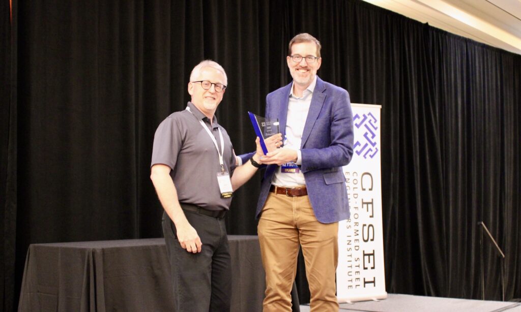 Jeff Klaiman, P.E., CFSEI managing director, presents the 2026 John P. Matsen Award for Distinguished Service to Benjamin Schafer, Ph.D., of Johns Hopkins University. The presentation took place during the 2026 CFSEI Expo in Long Beach, California.