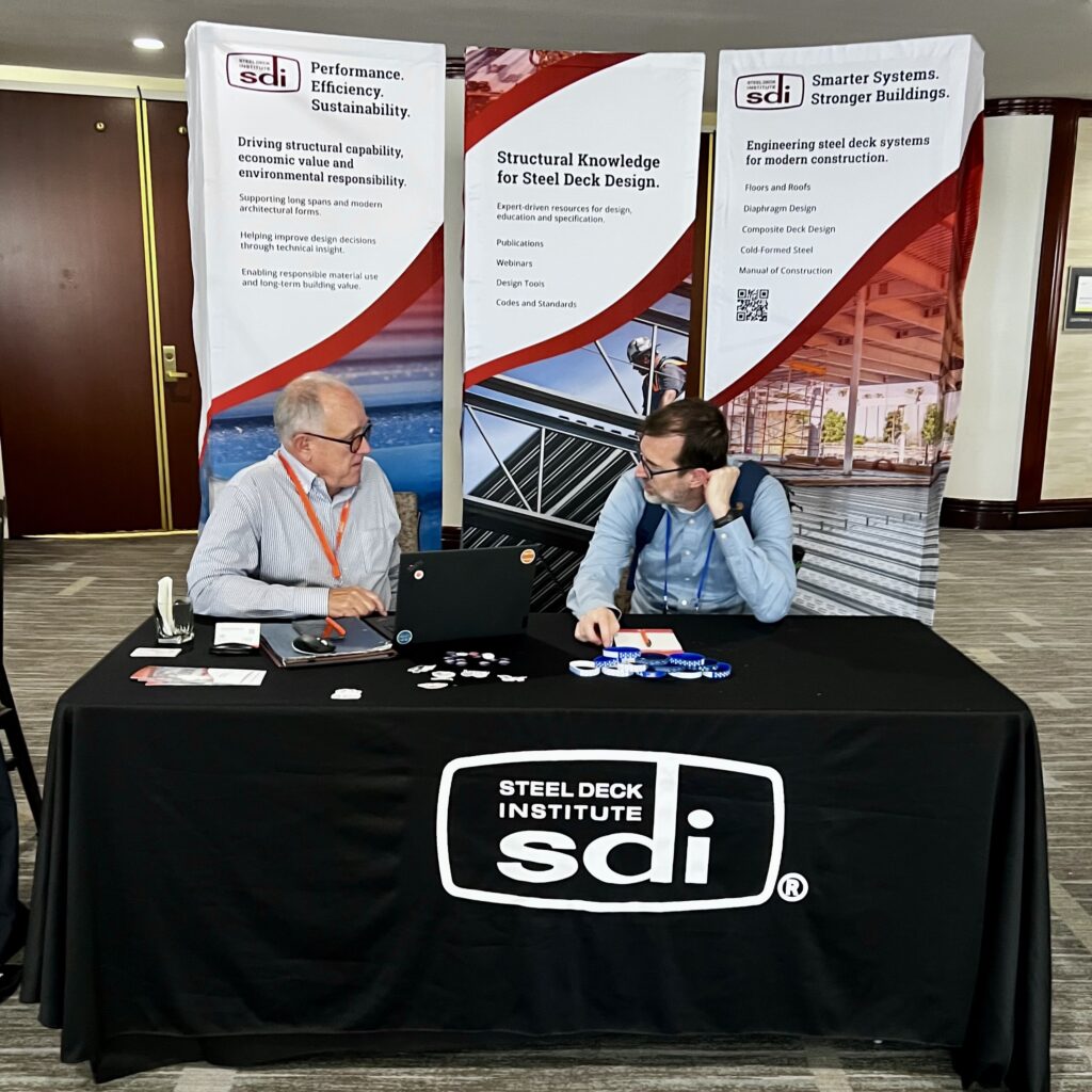 Ken Charles of the Steel Deck Institute visits with Benjamin Schafer, Ph.D., P.E., F.SEI, of Johns Hopkins University at the SDI booth during the 2026 CFSEI Expo in Long Beach, California. SDI participated as a Silver Sponsor of the conference.