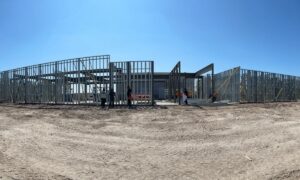 Engineers designed heavier framing members in select first-floor areas that carried the highest gravity and overturning loads. This approach optimized performance without overdesigning the entire structure.