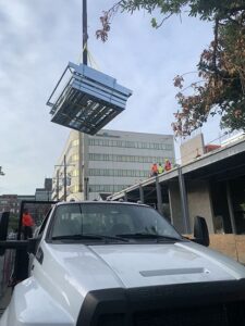 Crews hoist panelized cold-formed steel (CFS) wall panels into place during construction of Hotel Henrietta in New Orleans.