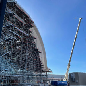 The exterior soffits followed long, radius-driven curves while changing pitch and angle around the building perimeter. Coordinated digital modeling defined the framing geometry before construction, reducing field adjustments and maintaining continuity.