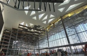 The Las Vegas Convention Center renovation modernized the North, Central and South Halls while introducing a new Central Hall Grand Lobby and enclosed concourse connections.