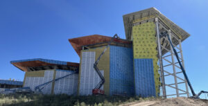 The U.S. Air Force Academy Visitor's Center challenged engineers to frame spaces exceeding 80 feet in height while accommodating 140-mph wind loads and aircraft-inspired architecture.