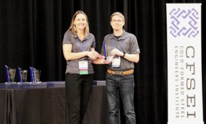 Josh Garton, P.E., S.E., McClure Accepts the CFSEI Design Excellence First Place Award, Residential/Hospitality Category Presented by Tammy Gleed, P.E., CFSEI Immediate Past Chair