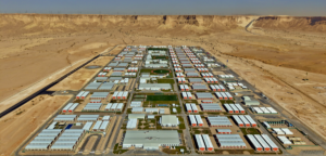 Built by Tamimi PEB, the $1.09 billion Qiddiya Contractors Camp in Saudi Arabia uses modular steel structures to accommodate approximately 40,000 workers. The development combines residential units with dining and recreation facilities designed for rapid deployment in support of the Kingdom's major infrastructure projects.