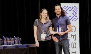 Michael Castleman, McClure Accepts the CFSEI Design Excellence Second Place Award, Commercial Category Presented by Tammy Gleed, P.E., CFSEI Immediate Past Chair