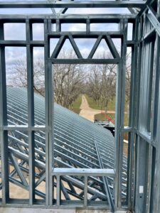 Customized cold-formed steel (CFS) wall and roof framing demonstrates the versatility and precision of steel framing in premium residential construction.