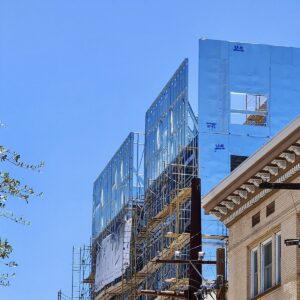 The 7-story West Point II Apartments uses vertically aligned cold-formed steel (CFS) bearing walls. The design eliminated concrete and structural steel transfer systems.  Photo courtesy of Industrialized Construction Solutions